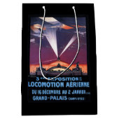 Flugzeug, das über Scheinwerfer-Plakat fliegt Mittlere Geschenktüte (Vorderseite)