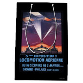 Flugzeug, das über Scheinwerfer-Plakat fliegt Mittlere Geschenktüte (Rückseite)