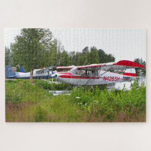 Flugzeug mit weißem und rotem Schwimmer, Lake Hood Puzzle