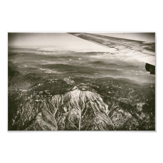 Flugzeug über schneebedeckte Berge Fotodruck (Vorne)