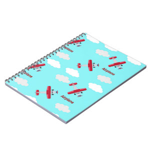 Flugzeugmuster in blau notizblock