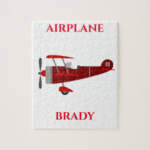 Flugzeugpuzzle mit personalisiertem Namen. Puzzle