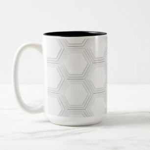 Fluid Symmetry: Erforschung abstrakter Designs im Zweifarbige Tasse
