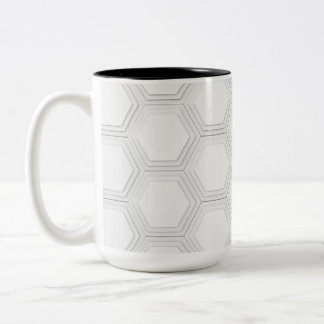 Fluid Symmetry: Erforschung abstrakter Designs im Zweifarbige Tasse