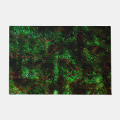 Fluktuation von dunklen Flecken auf leuchtend grün Fußmatte (Vorderseite)