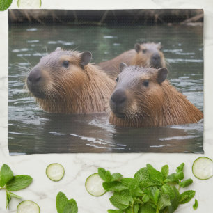 "Fluss Serenity: Capybaras schwimmen im Fluss" Geschirrtuch