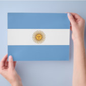 Flyer mit der Flagge Argentiniens (Hand)
