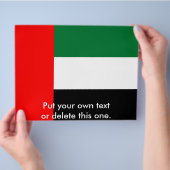 Flyer mit der Flagge der Vereinigten Arabischen Em (Hand)