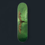 Flying Dragon Green Nebula Galaxy Monogram Skateboard<br><div class="desc">Dieses Design kann personalisiert werden, indem Sie die Option Anpassen auswählen, um Text hinzuzufügen oder andere Änderungen vorzunehmen. Wenn dieses Produkt die Möglichkeit hat, das Design auf einen anderen Gegenstand zu übertragen, stellen Sie bitte sicher, dass das Design bei Bedarf angepasst wird. Kontaktieren Sie mich unter colorflowcreations@gmail.com , wenn Sie...</div>