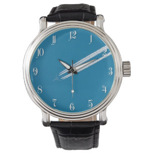 Flying Flugzeug on a blue sky background Armbanduhr