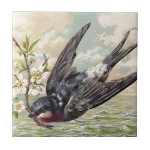 Flying swallow with flower twig fliese