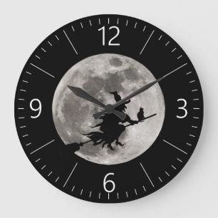 Flying witch with a bright moon behind her große wanduhr
