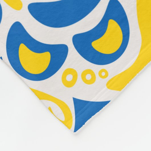 Folklore-Muster mit ukrainischen Flaggenfarben Fleecedecke (Ecke)