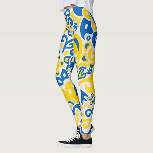 Folklore-Muster mit ukrainischen Flaggenfarben Leggings (Links)