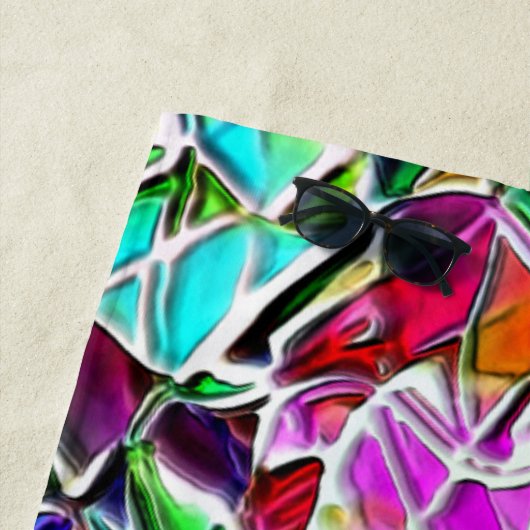 Form von farbigen und glänzenden Steinen in Milch Strandtuch (Beispiel)