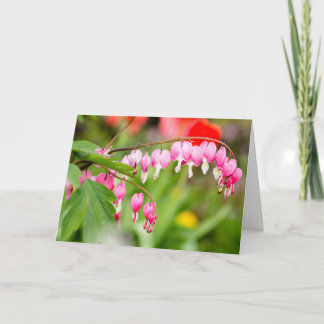 Foto blutender Blume des Herzens Karte