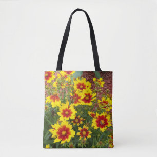 Foto der sonnigen rot-gelben Coreopsis-Blume auf e Tasche