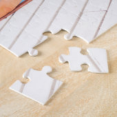 Foto einer Frau, die sich in einem Schwimmbad ents Puzzle (Seite)