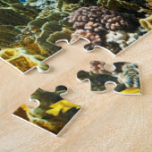 Foto eines tropischen Fisches auf einem Puzzle (Seite)