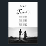Foto für Hochzeiten mit weißem und schwarzem Skrip Tischnummer<br><div class="desc">Ein wunderschönes, weißes und schwarzes Kalligraphiedesign zeigt das Foto des Paares. Ein modernes Hochzeitskoppel-Foto-Design mit einfachen minimalistischen Elementen. Ein idealer Hochzeitstil für jeden, der Kalligraphie, Schwarz-Weiß-Tischnummer und Foto-Hochzeitskunst Liebe. Auch die passenden Hochzeitseinladungen und andere Schreibwaren sind verfügbar. Passen Sie die Anzahl an und erwerben Sie jede Tabellennummer individuell, je nachdem,...</div>