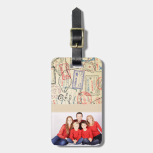 Foto Gepäckmarke mit Briefmarke für Reisen Gepäckanhänger