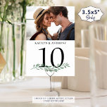 Foto Greenery Wedding Tischnummer Sign<br><div class="desc">Dekorieren Sie Ihre Hochzeitstische mit Foto-Erinnerungen auf den Schildern der Tischnummer. Diese 3, 5x5"-Zeichen verfügen über ein Foto auf jeder Seite (gleich oder anders), Namen und Aquarellfarben. Beinhaltet verschiedene Fotos der Verlobung von Braut und Bräutigam oder verabrede Bilder durch die Jahre, um die Gäste am Tisch zu unterhalten und sich...</div>