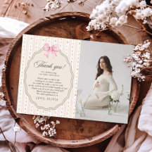 Foto von Baby Shower mit rosa Schleife und Blumen