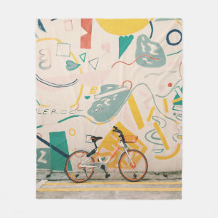 FOTOGRAFIE DES ORANGE- UND WEISSEN FAHRRADES FLEECEDECKE