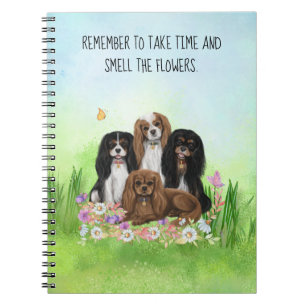Four Cavalier King Charles Spaniels in Blume Notizblock