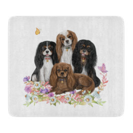 Four Cavalier King Charles Spaniels in Blume   Schneidebrett