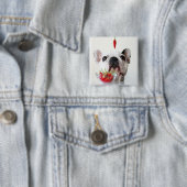 Französische Bulldogge, die einen roten Pfeffer Button (Beispiel)