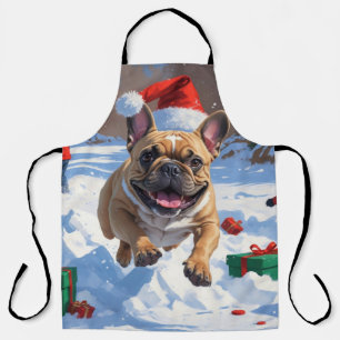 Französischer Bulldog im Schnee mit Weihnachtsmütz Schürze