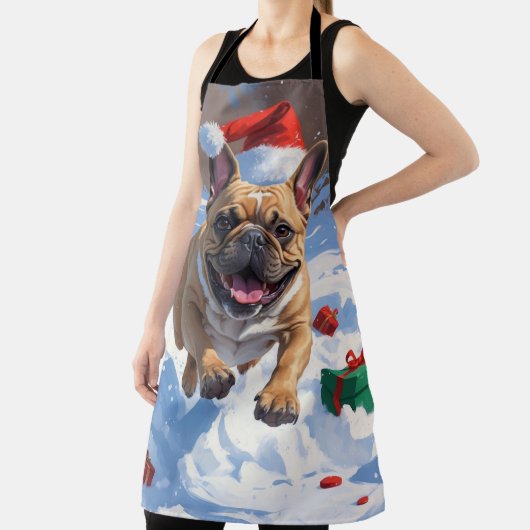 Französischer Bulldog im Schnee mit Weihnachtsmütz Schürze (InSitu)