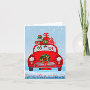Französischer Bulldog in Auto mit dem Weihnachtsma Karte
