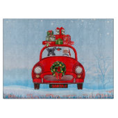 Französischer Bulldog in Auto mit dem Weihnachtsma Schneidebrett (Vorderseite)