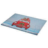 Französischer Bulldog in Auto mit dem Weihnachtsma Schneidebrett (Ecke)