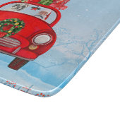 Französischer Bulldog in Auto mit dem Weihnachtsma Schneidebrett (Ecke)