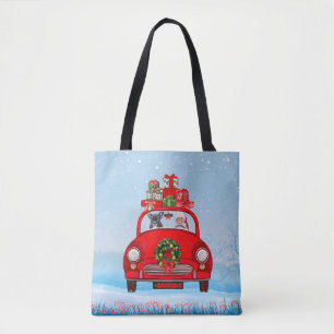 Französischer Bulldog in Auto mit dem Weihnachtsma Tasche