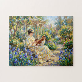Frau beim Lesen im Garten mit Cavalier Spaniel Puzzle