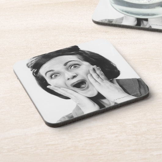 Frau, die Gesicht macht Untersetzer (Linke Seite)