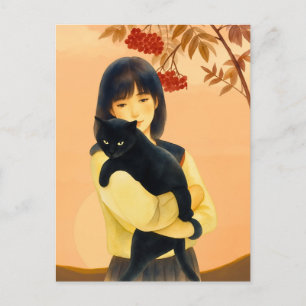 Frau hält eine schwarze Katze im Herbst Postkarte