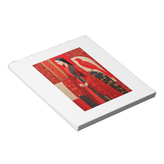 Frau in blühendem Kleid mit rotem Blütenmuster und Notizblock (angewinkelt)