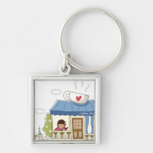 Frau in einer Kaffeestube Schlüsselanhänger