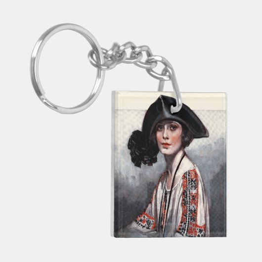 Frau in gestickter Bluse Schlüsselanhänger (Vorderseite links)