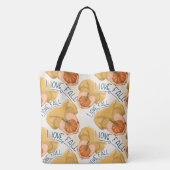 FRAU IN GOLD SWEATER HOLDING TINY PUMPKIN TASCHE (Rückseite)