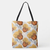 FRAU IN GOLD SWEATER HOLDING TINY PUMPKIN TASCHE (Rückseite)