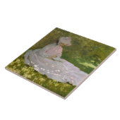 Frau liest Frühlings-Monet Fliese (Seite)