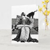 Frau liest mit schwarzer Katze Karte (Gelbe Blume)