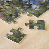 Frau mit Parasol im Garten von Auguste Renoir Puzzle (Seite)