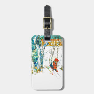 Frau pupft auf ihren Skiern Gepäckanhänger